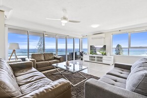 Experience luxury living while lounging around this elegant living room
