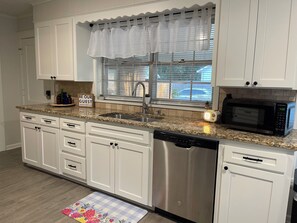 Stainless dishwasher, granite countertops and microwave