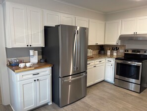 spacious kitchen with stainless appliances