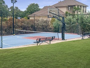 "Get active and have fun on our versatile sports court, perfect for basketball, volleyball, pickleball, soccer, and more! Whether you're playing a friendly match or honing your skills, this sp