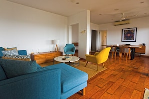 The living room space can be converted to allow a 5th guest to stay.