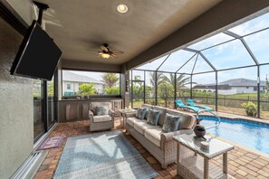Perfect outdoor space overlooking the pool and canal.