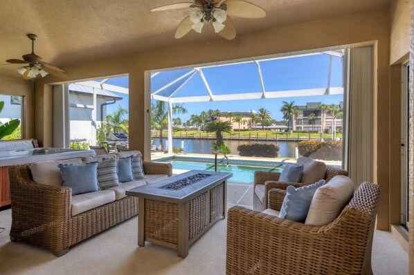 Lots of outdoor living space. Overlooking pool &amp; canal