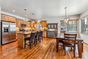Kitchen: Drip coffee maker, blender, kettle, toaster oven, Crockpot, cooking utensils, tableware 
