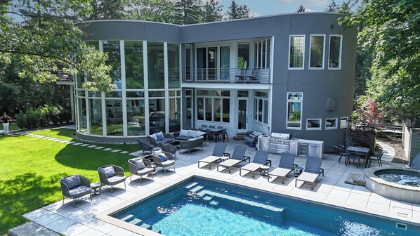 The views of the pool and the main house offer a perfect combination of relaxation and elegance