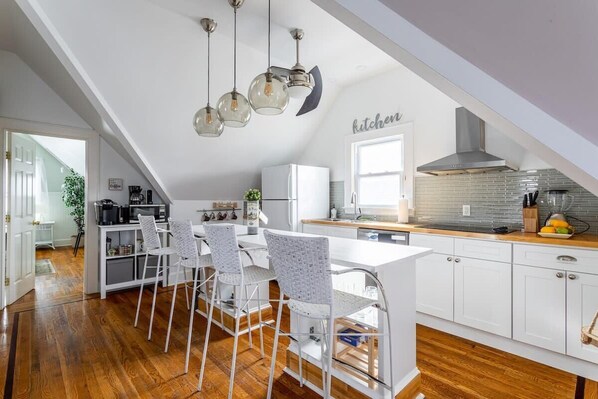 Modern dining furniture complementing the living space.