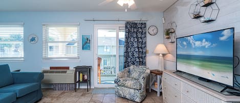 Curl up in the cozy coastal living area & stream all your favorite entertainment