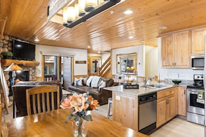 Spacious Living Room w/ Fireplace, TV & Patio