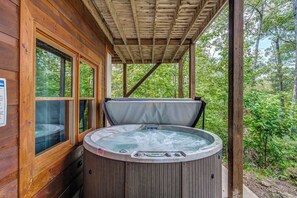 Soak all your cares away with breathtaking views in the private hot tub