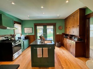 Butler House - Stunning Kitchen with Soapstone countertops and French door to the patio.