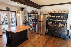 Farmhouse Kitchen fully stocked with dishes and cookware. (2)