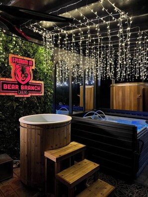 Hot tub, cold plunge and sauna for exclusive use by the Adult-Only treetop cottage guests. 
