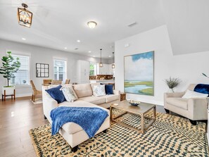 Our home boasts a light and airy ambiance, featuring an abundance of windows that invite natural sunlight and light furnishings that enhance the open, breezy feel. It’s the perfect setting to relax and enjoy the beauty of the surrounding area.