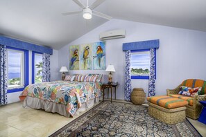 The upstairs bedroom suite with private balcony and en-suite bath!