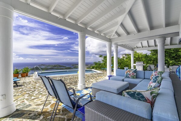 Spacious outdoor seating area with an incredible view!
