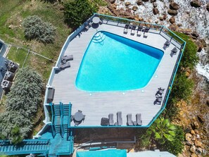 This cliffside pool is just steps away from the condo and one of three pools you will have access to.