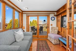 Sunroom with slider to deck