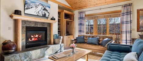Stream your favorites on the smart TV while staying cozy by the fireplace—ultimate comfort and entertainment in one!