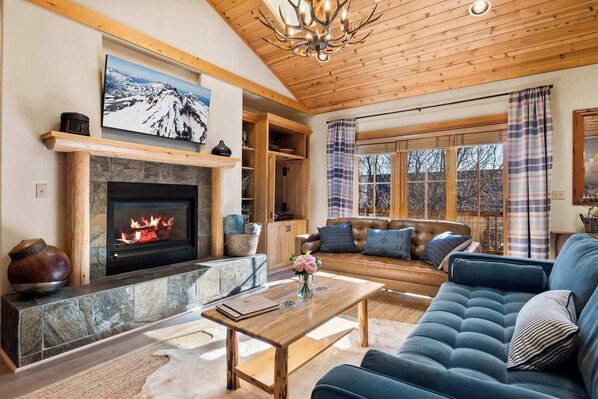 Stream your favorites on the smart TV while staying cozy by the fireplace—ultimate comfort and entertainment in one!