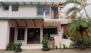 The house’s front facade is prominently designed