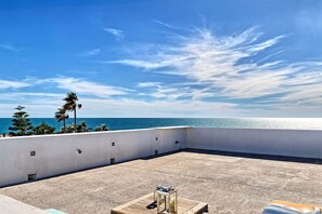 This Home has a Rooftop Party Deck!