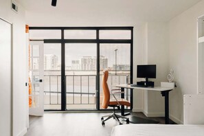 Desk, chair, and monitor available for guest use