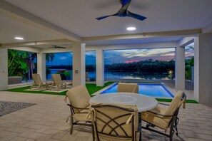 Enjoy the sunset under the lounge area of the home