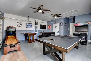2-CAR GARAGE:  Game Room with 55” Flat-Screen TV, PlayStation 4 and Seating for 2-3 People
