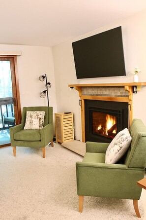 Cozy gas fireplace, smart TV and cable