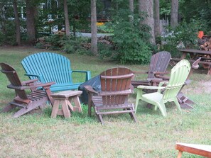 Lakefront fire pit with plenty of chairs and wood!