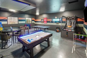 Challenge your family and friends in our vibrant game room, featuring activities for all ages!