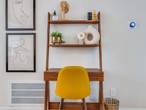 A dedicated desk space makes it easy to catch up on work or plan your next Savannah adventure.
