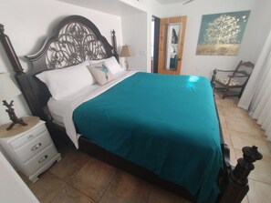 King size bed in master bedroom