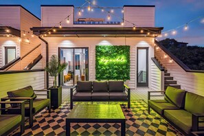 Experience a luxurious rooftop oasis in Downtown Nashville! Ideal for large groups, relax under twinkling lights and enjoy the vibrant atmosphere—it's more than just a stay; it's a destination.