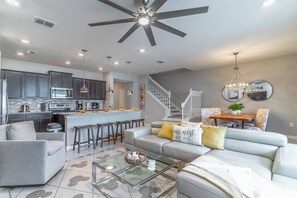 Open concept ground floor with easy access to the kitchen, living room, dining room and private pool!
