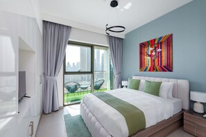 Enjoy a restful night’s sleep in this stylish queen bed, framed by modern art and natural light from large windows Wake up to stunning views of Dubai’s skyline from the comfort of your plush queen-sized (200x160) bed