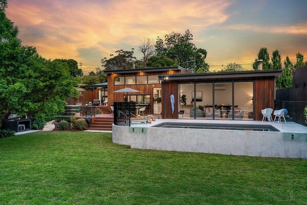 The stunning backyard, entertaining areas. Just newly landscaped.