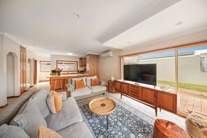 Living space downstairs - relax in the super comfy sofas