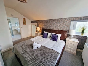 Snuggle up in this serene, quiet space designed for restful sleep