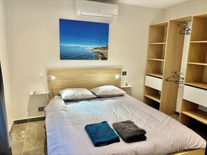 Bedroom 1, with double bed and dressing. Bed linen and towels are provided