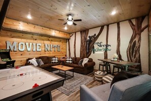 Games, movies, bunkroom, full bath and hot tub right outside!