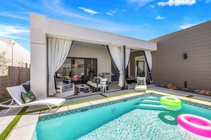 Private pool with patio and outdoor seating