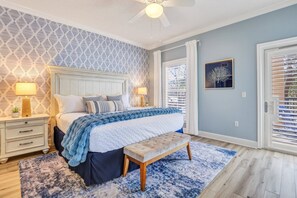 Master Bedroom - King Bed, TV and fold up work desk stored under the bed. 