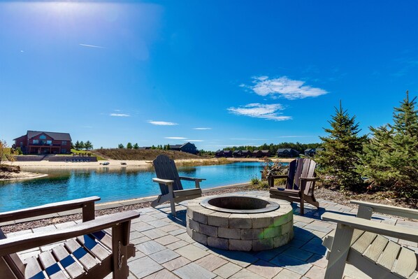 Fire pit area overlooking the beach area.  We provide firewood for your stay.