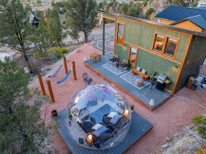Enjoy the outdoors with all that our tiny home and stargazing dome bedroom have to offer.