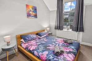 Second bedroom with double bed and mountain views