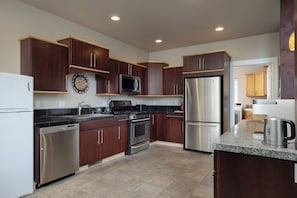 Unleash your culinary creativity in the fully equipped kitchen