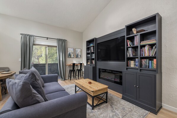 Curl up in the sunshine-filled living room & enjoy a movie night at home