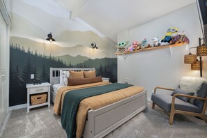 The second of two bedrooms, with a comfy queen-sized bed & Smart TV
