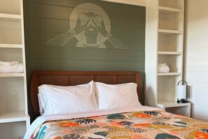 Custom mural, built in storage and en suite bathroom with shower in bedroom 1